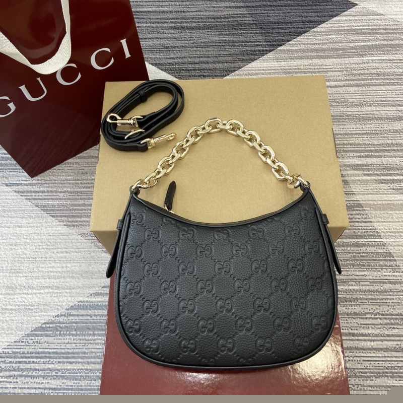 G*u*i top handle bags